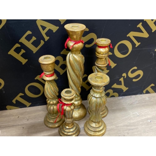 581 - 5x large gilt resin candlesticks (different styles & sizes, largest being 41cm)