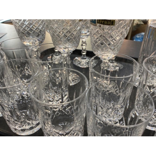 587 - Tray of Irena drinking glasses & decanter with stopper also includes 10 Waterford Crystal drinking g... 