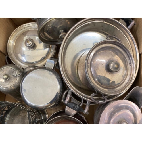 592 - Box of miscellaneous silver plated items to include lidded pots, toast rack, candle sticks etc