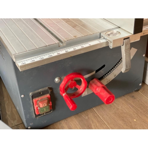 603 - Table top mitre saw with workman’s metal table