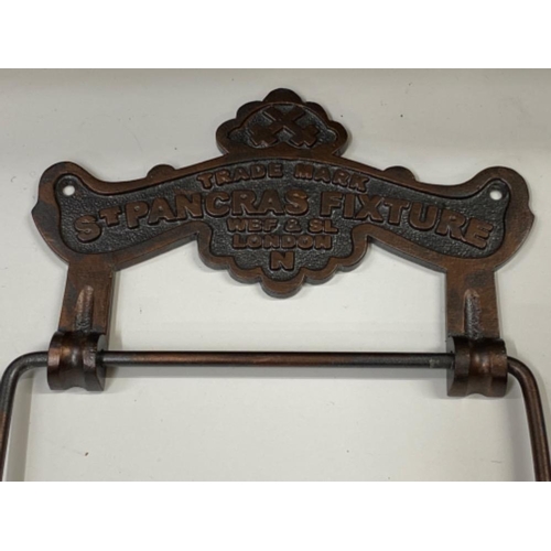 605 - A St Pancras Bronzed metal toilet roll holder