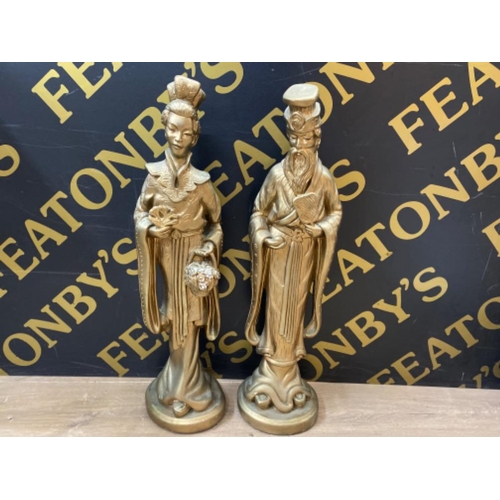 607 - Pair of large resin oriental figures (painted gold) Height 65cm