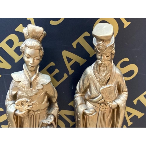 607 - Pair of large resin oriental figures (painted gold) Height 65cm