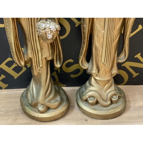 607 - Pair of large resin oriental figures (painted gold) Height 65cm