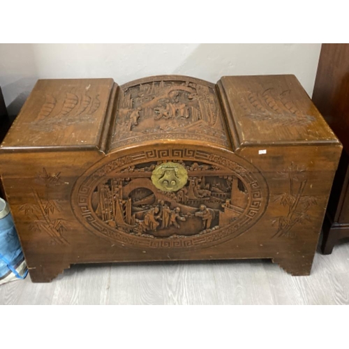 622 - Heavily carved Asian camphor wood chest, 102x51x58cm