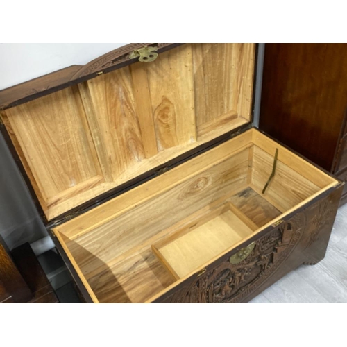 622 - Heavily carved Asian camphor wood chest, 102x51x58cm