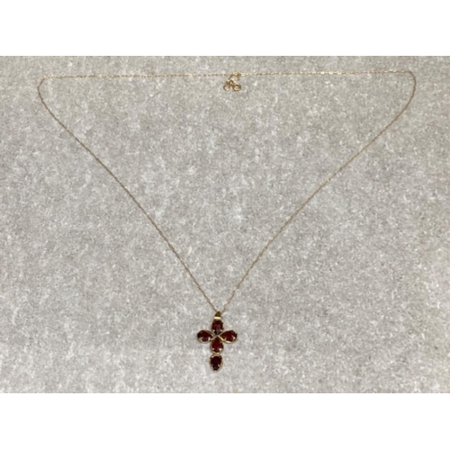 63 - 9ct yellow gold & 5 stone garnet crucifix pendant on 9ct gold chain, 1.1g gross