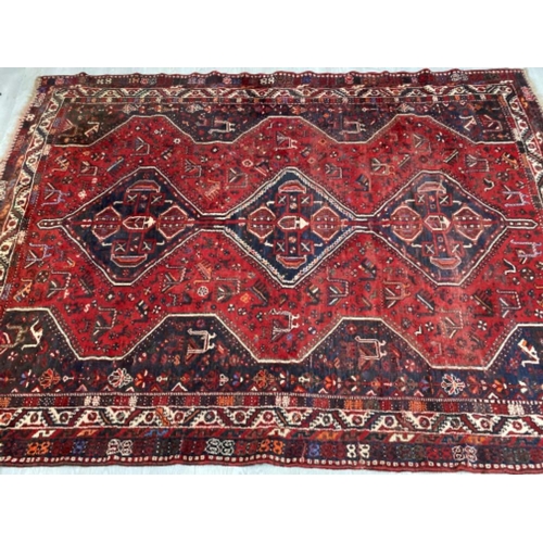 630 - Large fringed eastern carpet 297x221cm