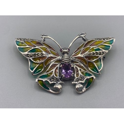 67 - A silver and plique a jour butterfly brooch with amethyst cabochon,12.2g