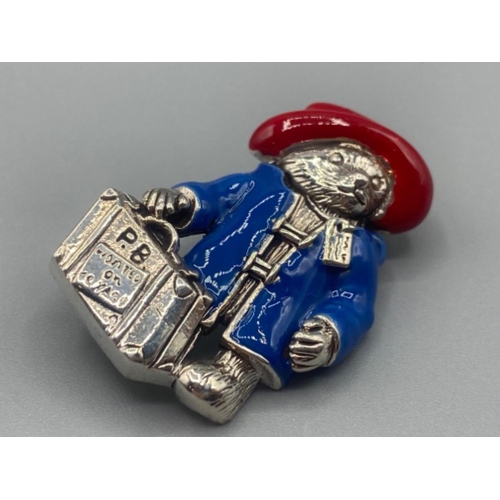 68 - A sliver and enamel paddington bear brooch, 11.0g