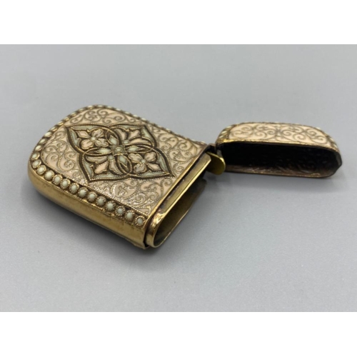 82 - A brass cased anderson style vesta