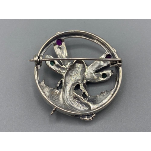 84 - A silver art nouveau style fairy brooch set with ruby and emerald cabochons, 9.8g