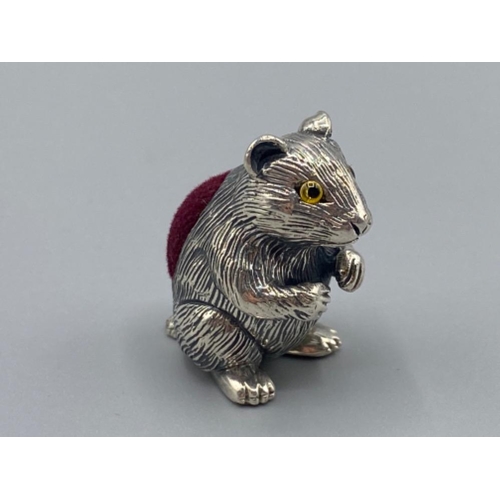 91 - A silver hamster pin cushion, 15.7g