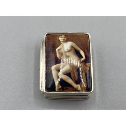 94 - A silver pill box with nude enamel lid, 19.5g