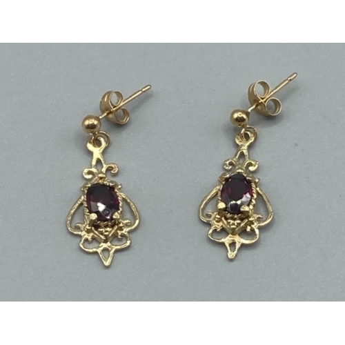 99 - Ladies 9ct yellow gold red stone drop earrings 1.9g gross