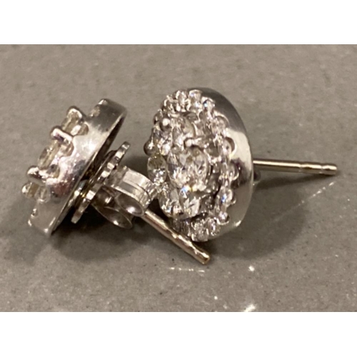 107 - 14ct white gold & 1.5cts diamond stud style earrings