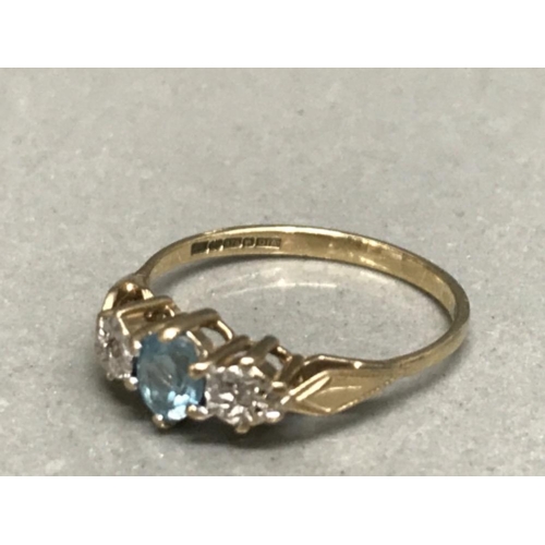 121 - 9ct yellow gold topaz and diamond 3 stone ring size N 1.63g gross