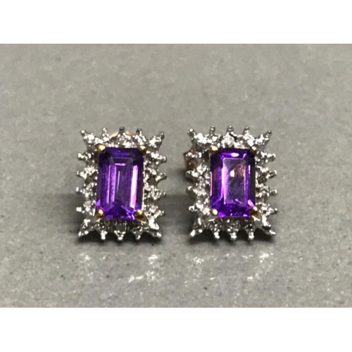 123 - 9ct yellow gold amethyst And diamond stud earrings 1.75g gross