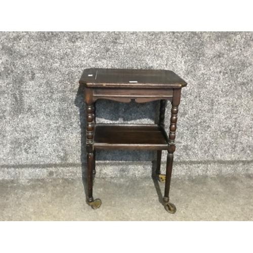 130 - Antique mahogany 2 tier serving trolley on castors