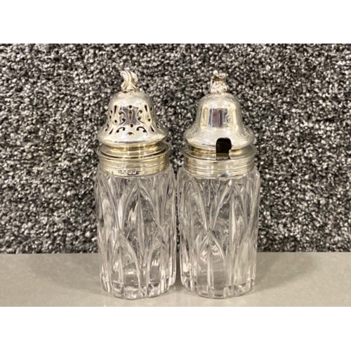 23 - Antique pair of silver topped glass sugar/condiment bottles, hallmarked London