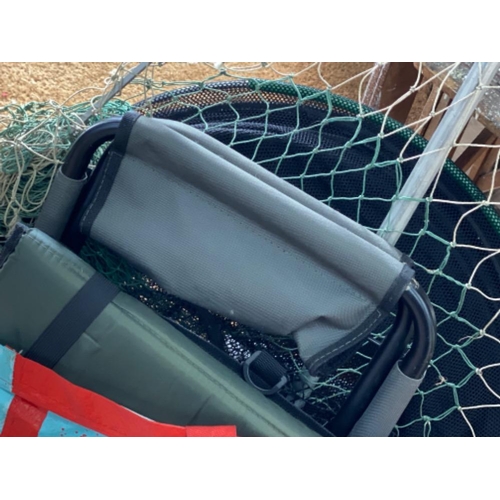 235 - Bag containing a variety of fishing landing nets & protective rod tubes etc also includes folding ch... 