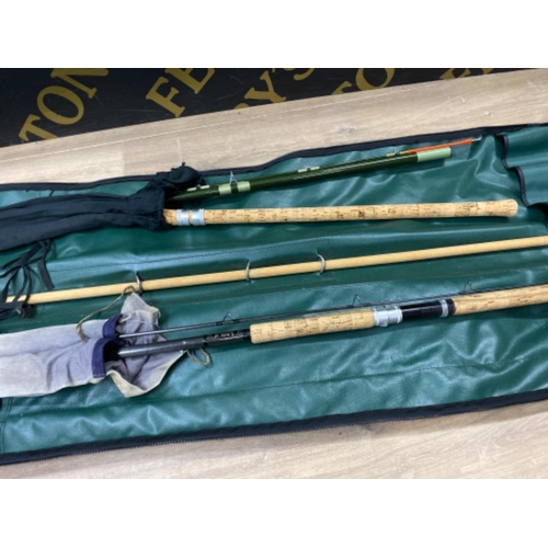 237 - Pair of vintage fishing rods, in protective cover