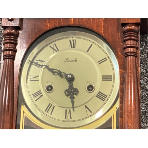 252 - Lincoln Chiming mahogany cased wall clock, comes complete with key & instructions, 66.5x28cm