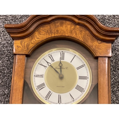 253 - London Clock Co chiming wall clock in flame & standard mahogany case, working condition (though chim... 