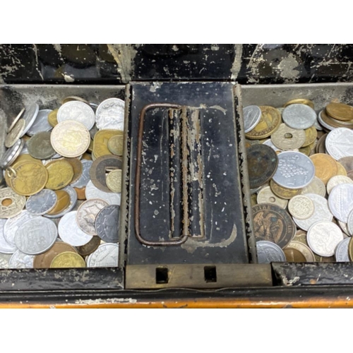 40 - Vintage metal deed box containing a large quantity of miscellaneous foreign coinage