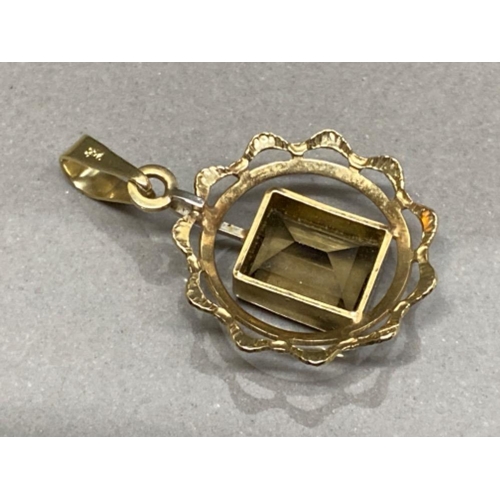 66 - 9ct yellow gold pendant with large smoky Quartz centre stone, 2.6g gross