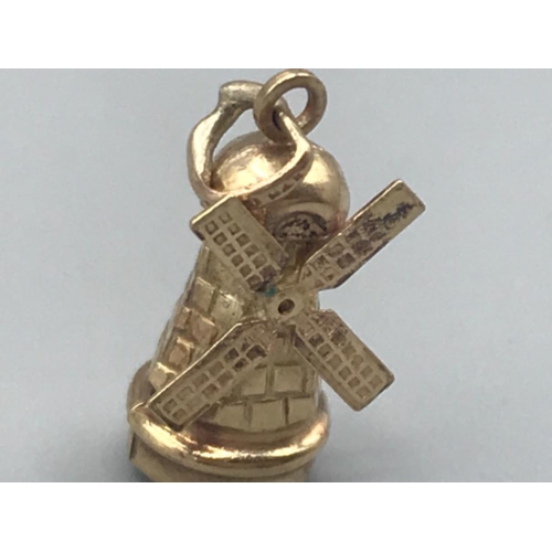 93 - 9ct gold windmill charm 1.4g