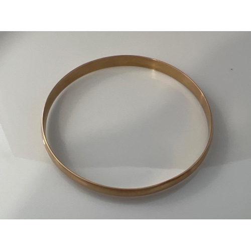 150 - 9ct gold bangle. 13.8g - This will be available for collection from 27th August as currently located... 