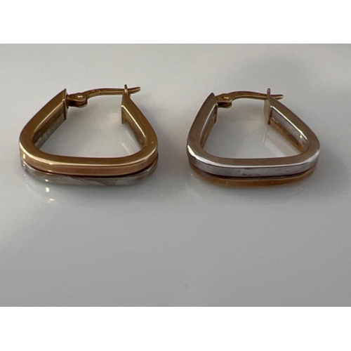 152 - Ladies 9ct gold two tone fancy shaped earrings. 2.6g - This will be available for collection from 27... 