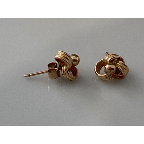 161 - Ladies 9ct gold fancy knot stud earrings.  0.6g - This will be available for collection from 27th Au... 