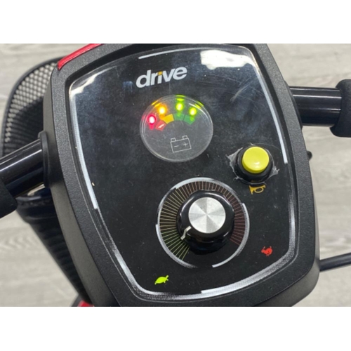 2 - Scout drive electric mobility scooter “shop assist” in good working condition with key, charger & in... 