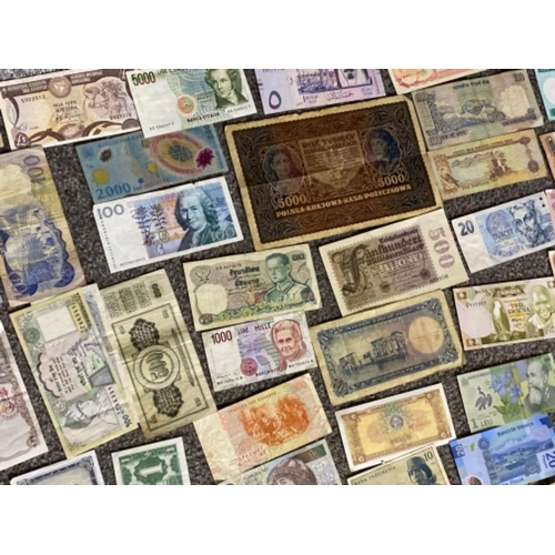 214 - Over 100 miscellaneous banknotes from around the world - mixed circulated grades