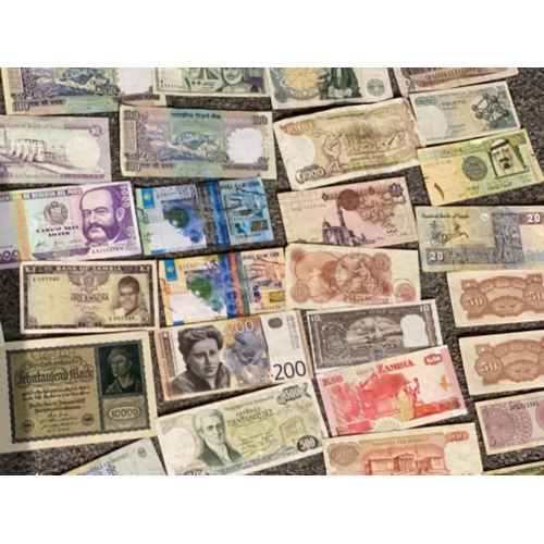 214 - Over 100 miscellaneous banknotes from around the world - mixed circulated grades