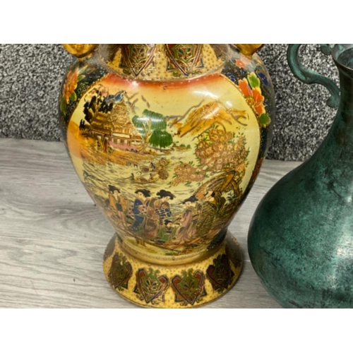 245 - Large nicely decorated oriental style twin handled vase & brass/bronze vase