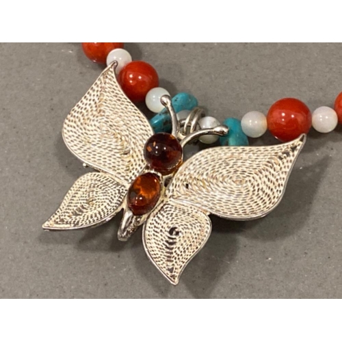 263 - Coral, turquoise & amber bead necklace with amber set butterfly pendant