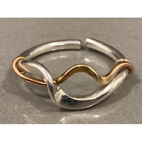 266 - Pair of silver & gold rings by Burkmar, sizes U & S, 7.7g gross weight