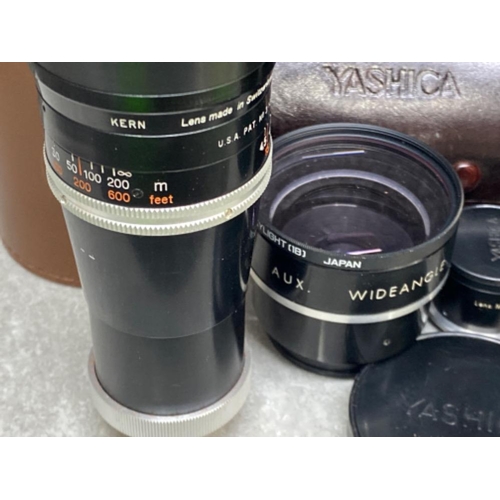 273 - 3 lens in original protective cases to include Yashica wide lens etc