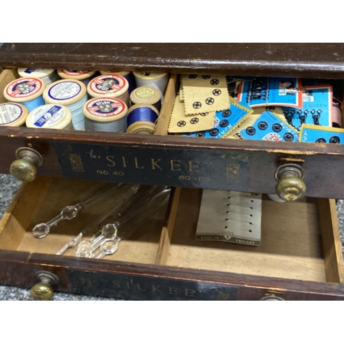 304 - Mahogany 3 drawer table top sewing chest fitted with brass handles “Silkee” with contents