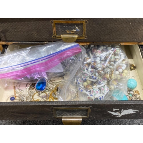 33 - 4 drawer table top chest filled with various pieces costume jewellery