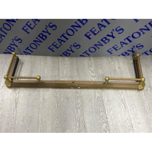 345 - Vintage brass “6 ball” fire fender