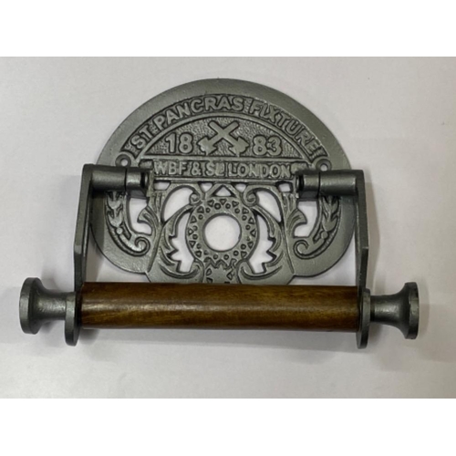 364 - Cast metal St Pancras toilet roll fixture (holder)