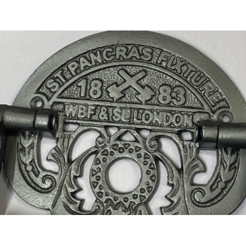 364 - Cast metal St Pancras toilet roll fixture (holder)