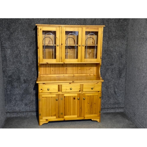 408 - Pine kitchen dresser fitted with triple glass doors, 121x45cm, Height 181cm