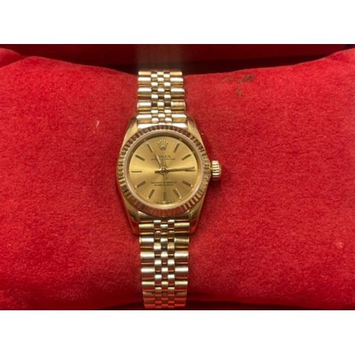 20 - Ladies 18ct gold Rolex Oyster Perpetual 67198 watch year 1998 with original box and papers in good c... 