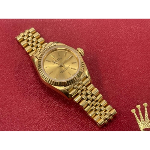 20 - Ladies 18ct gold Rolex Oyster Perpetual 67198 watch year 1998 with original box and papers in good c... 