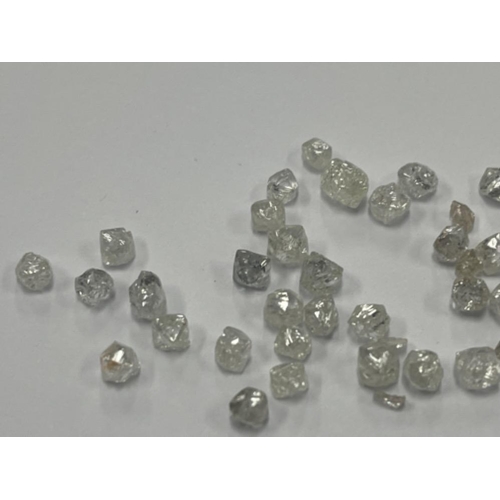 23 - 10.58cts of Natural Rough Diamonds various sizes - ungraded